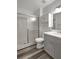 Bathroom featuring tile floors, a glass shower, and a gray vanity at 4129 Marlow Loop, Land O Lakes, FL 34639