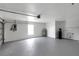 Spacious garage with a window, water heater, overhead door opener and ample room for storage at 4129 Marlow Loop, Land O Lakes, FL 34639