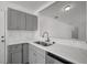Modern kitchen featuring a breakfast bar, quartz countertops and updated appliances at 4129 Marlow Loop, Land O Lakes, FL 34639