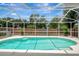 Refreshing screened-in pool offers a private outdoor retreat, perfect for relaxation at 4129 Marlow Loop, Land O Lakes, FL 34639