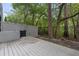 Private backyard deck, perfect for outdoor dining or relaxing, with a view of the natural surroundings and a fenced perimeter at 4148 Gauge Line Loop, Tampa, FL 33624