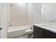 Clean bathroom with a tub and shower combination, subway tile, and modern vanity at 4148 Gauge Line Loop, Tampa, FL 33624
