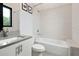 Clean bathroom featuring a tub and shower combination with subway tile, and modern vanity at 4148 Gauge Line Loop, Tampa, FL 33624