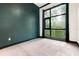 Inviting bedroom featuring a large window that offers plenty of natural light and pleasant backyard views at 4148 Gauge Line Loop, Tampa, FL 33624