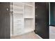 Well-organized closet with custom shelving, drawers, and hanging space to maximize storage and keep belongings tidy at 4148 Gauge Line Loop, Tampa, FL 33624