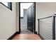 Inviting entryway with hardwood floors and an open door leading to an outdoor space, seamlessly blending indoor-outdoor living at 4148 Gauge Line Loop, Tampa, FL 33624