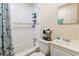 Standard full bathroom with neutral walls, white subway tile surround, and vanity sink at 4411 3Rd S Ave, St Petersburg, FL 33711