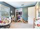 Playroom with storage and alphabet border at 5206 Cindy Kay Dr, Plant City, FL 33566