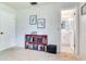 Inviting bedroom with a bookcase and easy access to the bathroom, providing a harmonious and functional layout at 5206 Cindy Kay Dr, Plant City, FL 33566