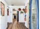 Hallway with wood floors leading to the kitchen at 5206 Cindy Kay Dr, Plant City, FL 33566