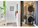 Laundry room featuring a stackable washer and dryer at 5206 Cindy Kay Dr, Plant City, FL 33566