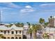 Beautiful view showcasing the beach and buildings of the community at 5353 Gulf Blvd # A402, St Pete Beach, FL 33706