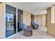 Balcony showcasing seating and sliding glass doors at 5353 Gulf Blvd # A402, St Pete Beach, FL 33706
