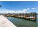 A new dock sits on calm water and offers multiple boat slips at 5353 Gulf Blvd # A402, St Pete Beach, FL 33706