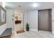 Condo entryway featuring neutral colors, tile flooring, and an open kitchen at 5353 Gulf Blvd # A402, St Pete Beach, FL 33706
