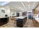 Bright kitchen with wooden cabinets, stainless steel appliances, and a spacious center island at 5353 Gulf Blvd # A402, St Pete Beach, FL 33706