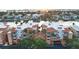Beautiful condominium complex with a terracotta roof, lush landscaping, and serene waterfront views, close to shops and the beach at 610 Pinellas Bayway S # 5202, Tierra Verde, FL 33715
