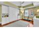 This flex room has hardwood floors, a murphy bed and lots of natural light at 610 Pinellas Bayway S # 5202, Tierra Verde, FL 33715