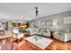 Open-concept floor plan features a comfortable living room that flows into the dining area and kitchen at 610 Pinellas Bayway S # 5202, Tierra Verde, FL 33715