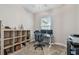 Bright office space with shelving and a comfortable workspace setup at 6825 Citrus Creek Ln, Tampa, FL 33625
