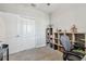 Cozy office space with shelving and a storage closet for organization at 6825 Citrus Creek Ln, Tampa, FL 33625