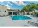 A welcoming community pool with ample seating, shade structures, and well-maintained grounds, providing residents with a relaxing oasis at 6825 Citrus Creek Ln, Tampa, FL 33625