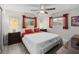 Comfortable bedroom with ample natural light, coordinated decor, and a peaceful atmosphere for rest and rejuvenation at 709 Pinewood Dr, Dunedin, FL 34698