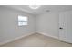 Bedroom featuring wood-look floors and natural light at 8045 Colton Dr, Port Richey, FL 34668