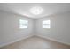 Bedroom featuring wood-look floors and natural light at 8045 Colton Dr, Port Richey, FL 34668