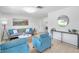 Inviting living room features modern furnishings and bright, neutral decor at 8045 Colton Dr, Port Richey, FL 34668