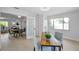 Office or flex room, showing natural light and access to the living room at 8045 Colton Dr, Port Richey, FL 34668