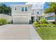 Charming two-story home with well-maintained landscaping, large driveway and a two car garage at 8050 Praise Dr, Tampa, FL 33625