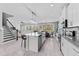 Open-concept kitchen with stainless steel appliances, large island and easy view to the living area at 8050 Praise Dr, Tampa, FL 33625