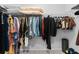 This walk-in closet offers ample hanging and shelf storage space for your wardrobe and accessories at 8050 Praise Dr, Tampa, FL 33625