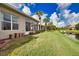 Mature backyard landscaping, privacy, and a beautiful pond create your own private oasis at 8354 Palmetto Ct, Englewood, FL 34224
