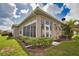 Enclosed lanai with sliding glass doors, providing an indoor/outdoor living space at 8354 Palmetto Ct, Englewood, FL 34224