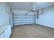 The home has an attached garage with cabinets for extra storage at 8354 Palmetto Ct, Englewood, FL 34224