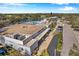 Community building with a pool, parking, and lake access, creating a desirable recreational and convenient environment at 8396 111Th St # 301, Seminole, FL 33772