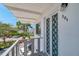 Balcony view of white condo building featuring a decorative railing at 8396 111Th St # 301, Seminole, FL 33772