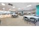 Spacious ballroom with ample seating, lighting, and dance floor, ideal for events and gatherings at 8396 111Th St # 301, Seminole, FL 33772