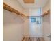 Walk-in closet with shelving and vinyl floors at 8396 111Th St # 301, Seminole, FL 33772