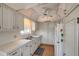 Bright kitchen with ample counter space, storage cabinets, and modern double bowl sink at 8396 111Th St # 301, Seminole, FL 33772
