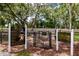 Community dog park with separate sections for large and small breeds, a great place for pets at 9317 Stone River Pl, Riverview, FL 33578