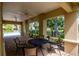 Outdoor patio area with seating and views of community pool at 9317 Stone River Pl, Riverview, FL 33578