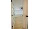 Hallway view showcasing modern doors and neutral walls, leading to bedroom at 3516 Norland Ct, Holiday, FL 34691