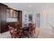 Dining room with built in cabinets, elegant lighting and hardwood table at 1060 N Shore Ne Dr # 6, St Petersburg, FL 33701