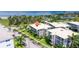 Waterfront condo complex with lush landscaping, palm trees, and stunning bay views at 1060 N Shore Ne Dr # 6, St Petersburg, FL 33701