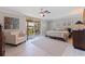 Relaxing primary bedroom with a ceiling fan and sliding doors to the balcony at 1060 N Shore Ne Dr # 6, St Petersburg, FL 33701
