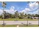 A beautiful scenic view of the neighborhood with palm trees and blue skies at 1060 N Shore Ne Dr # 6, St Petersburg, FL 33701