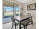 Bright dining area featuring a sliding glass door leading to the backyard at 11464 Chilly Water Ct, Riverview, FL 33569